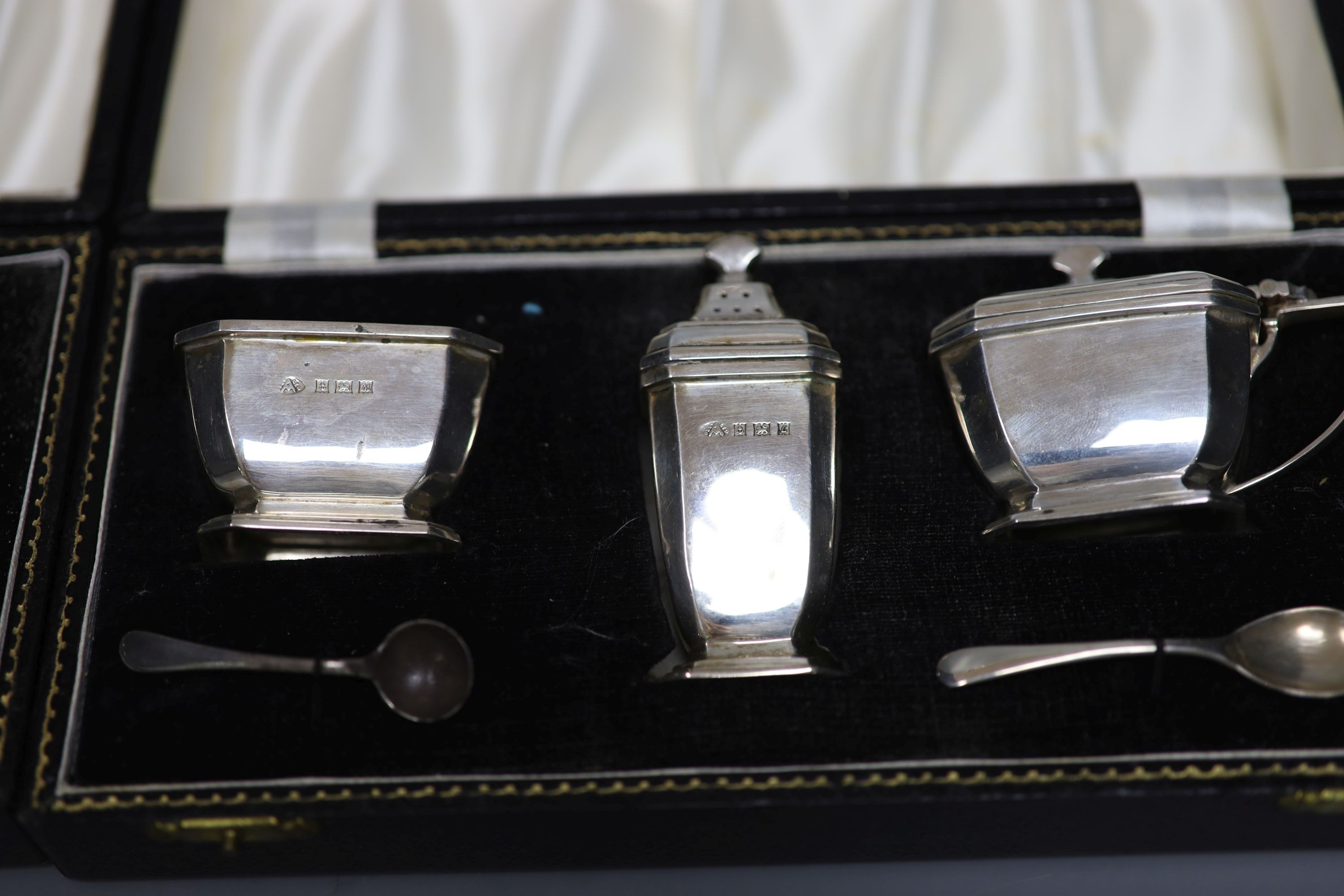 Two modern cased three piece silver condiment sets